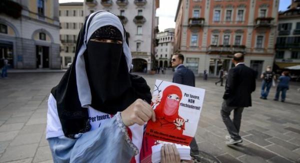 خبرنگاران نقض آزادی مذاهب در سوئیس؛ پوشیدن برقع ممنوع می گردد